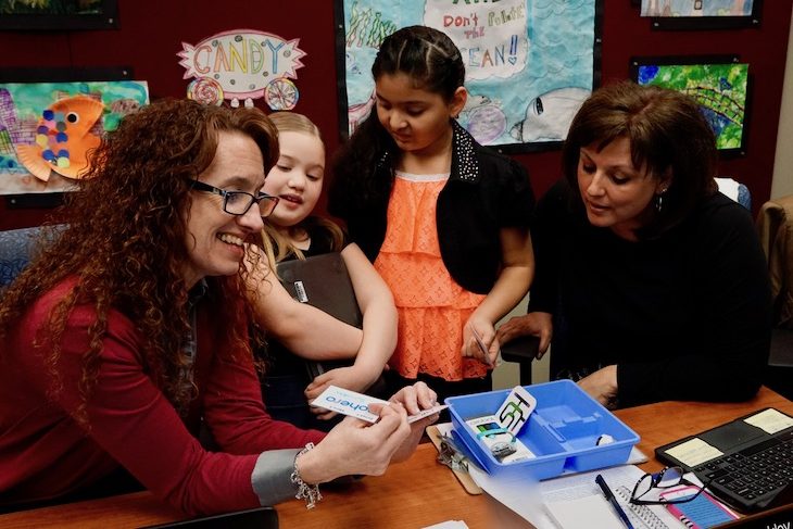 <p>H.C. Storm second-grade students showing Board Members how to code with Ozobot robots.</p>
