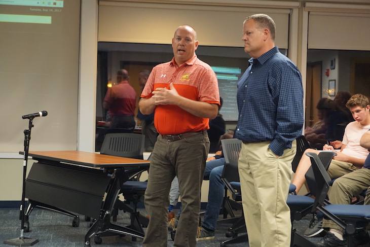<p>BHS Athletic Director Dave Andrews (left) and Batavia Youth Baseball Commissioner Mike Law announced a BYB donation of $14,000 to to build the freshman baseball backstop and install dugout fencing.</p>
