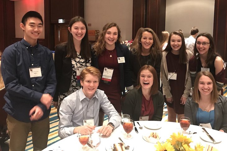 <p>BHS Key Club officers and members, including Student Ambassador Justin Chu (standing far left) at the Kiwanis Neuroscience Research Foundation Luncheon during the 68th annual Key Club District Convention and Leadership Conference in Springfield, Illinois.</p>
