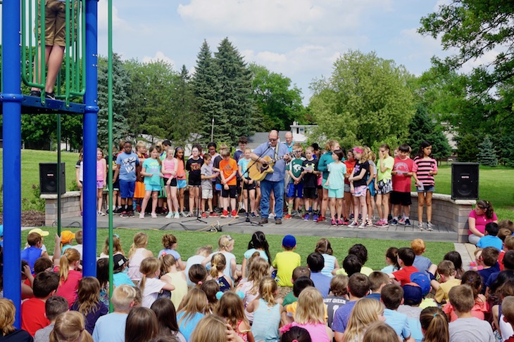 <p>At the dedication, LWS Music Teacher Walt Zimmer and the fifth-grade choir got the crowd singing John Denver’s classic, “Take Me Home, Country Roads.”</p>
