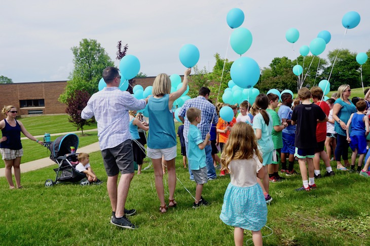 <p>To honor Katie and her favorite color, LWS students, staff, and family members filled the LWS sky with turquoise balloons.</p>
