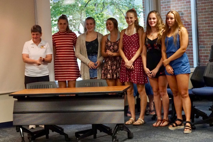 <p>BHS Head Volleyball Coach Lori Trippi-Payne with members of the 2017 varsity BHS volleyball team.</p>
