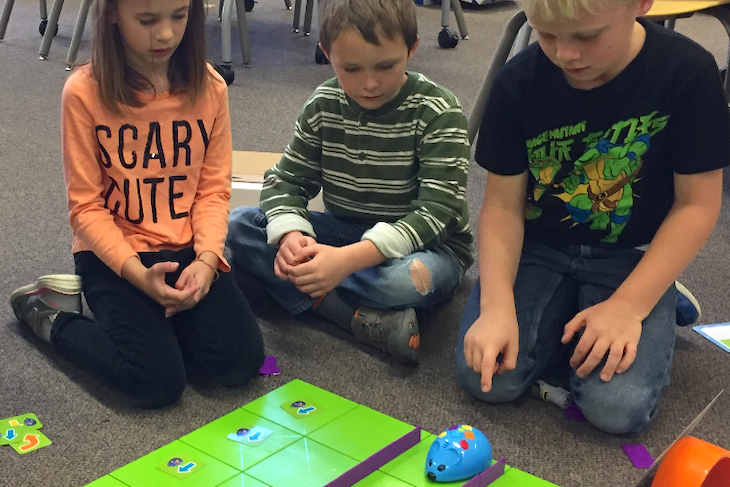 Mrs. Ashby has been working with Stacey Kilburg's first-grade class on coding and they recently broke out a "Code & Go Robot Mouse."