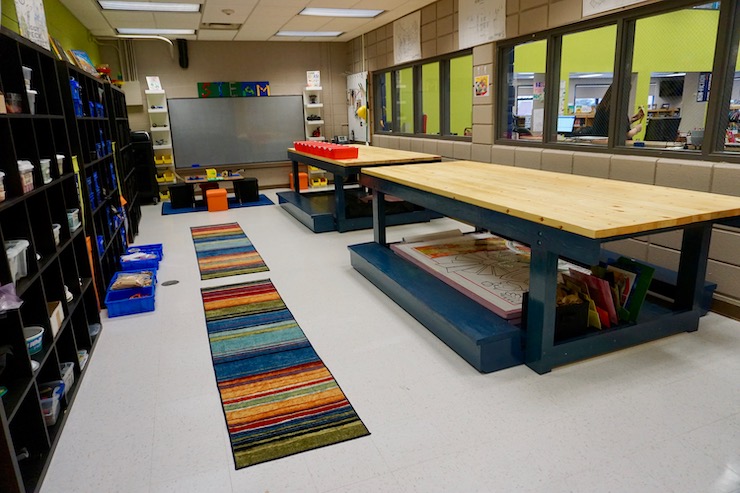 The two wooden workbenches can accommodate a full class for a S.T.E.A.M. activity.