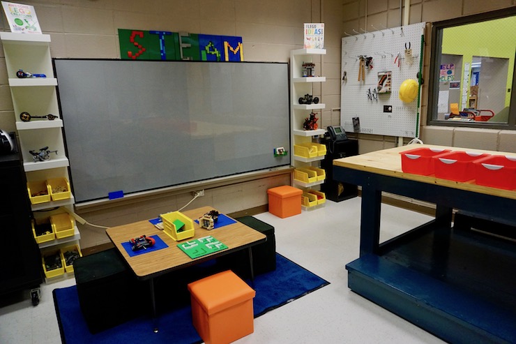 The LEGO zone features a giant wall for building with LEGOs.