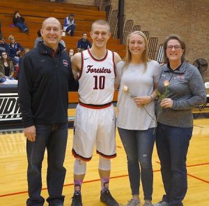 Katie with her brother, Michael, and parents Jeff and Cindy, at Lake Forest College.