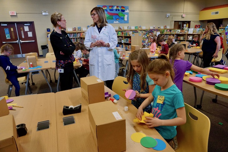 Hey, it's AGS first-grade teacher Miss Erickson in the background talking with Ms. Turner, a DuPage Children's Museum Instructor. The DuPage Children's Museum conducts several types of educational workshops (house calls!) in schools.