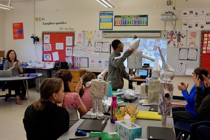 GMS fifth-grader Xavier Justice sharing his tin man, Xavier Jr., with fellow students at LWS. BPS101 enrichment teachers use remote learning technology to teach the same lesson to classes from different buildings.