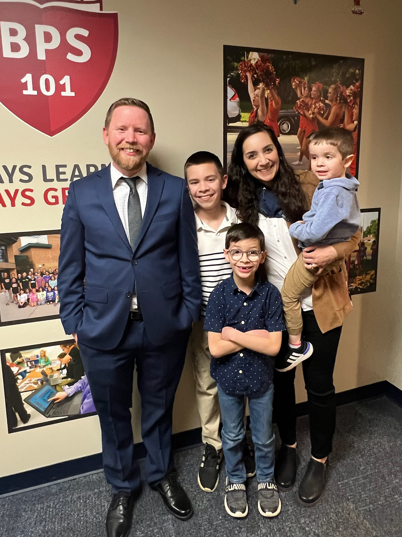 <p>Mike Wall and his family at the Board of Education Meeting on Feb. 20, 2024.</p>
