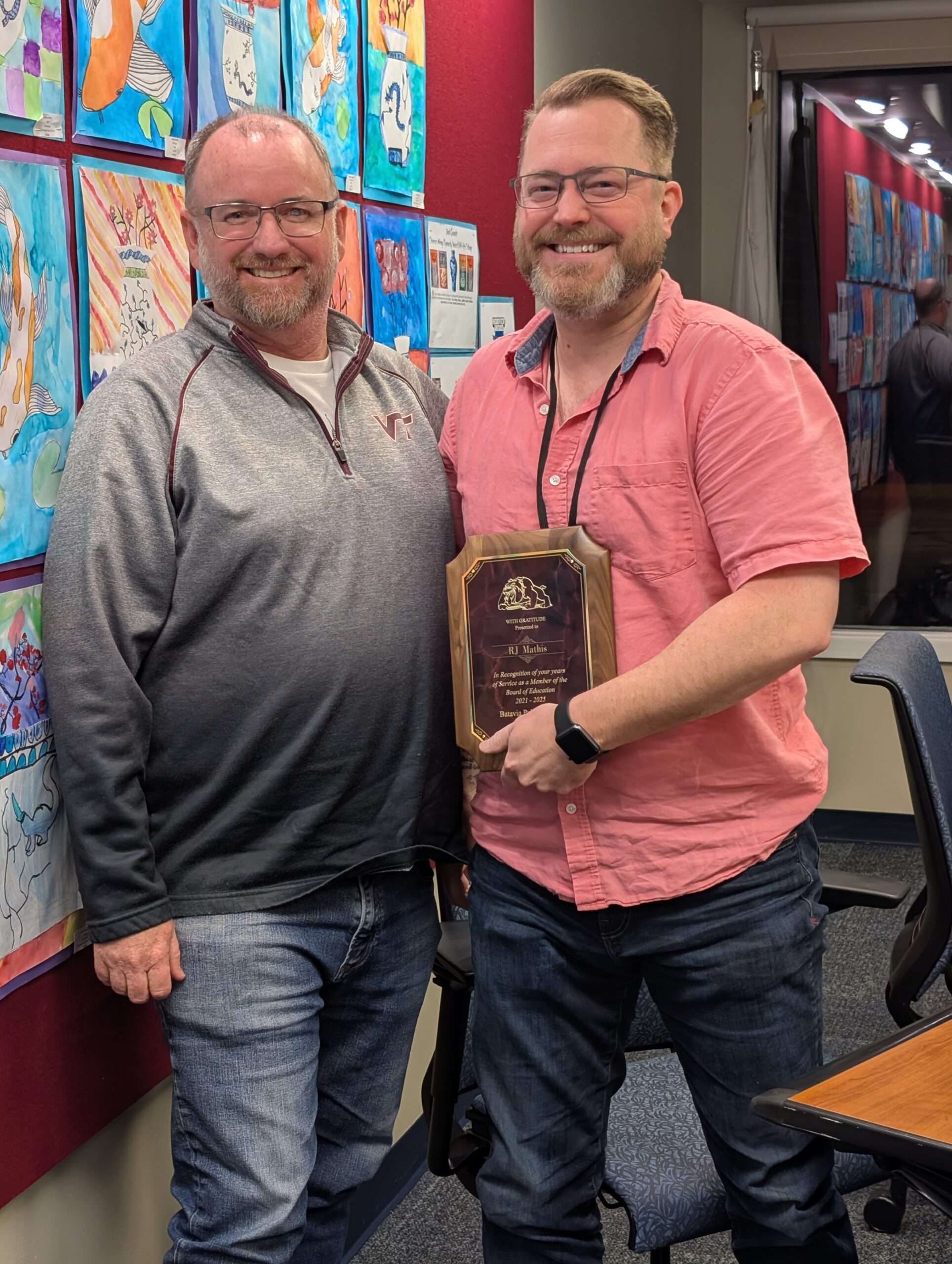 <p>Board President Craig Meadows thanks RJ Mathis for serving the BPS101 Board of Education for 12 years.</p>
