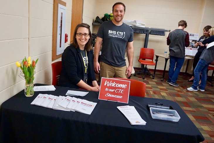 <p>BHS Graphics Arts Teacher Kathleen Tieri Ton and Business Teacher Mike Bryant greeting guests.</p>
