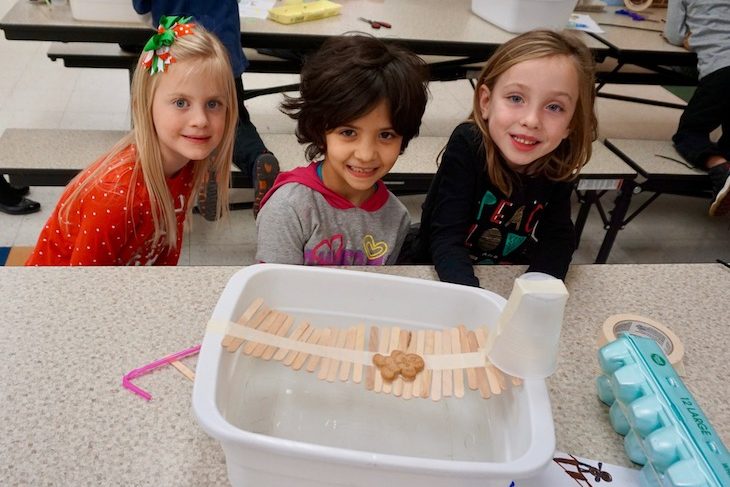 <p>Success! This gingerbread man made it across the river via a popsicle stick bridge.</p>
