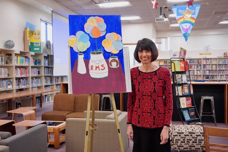 <p>RMS seventh graders and RMS reading teacher, Cara Schuster, created a piece of art for the arrival of author Margaret Peterson Haddix. Each of the “flower petals” is a note from students to Mrs. Peterson Haddix.</p>
